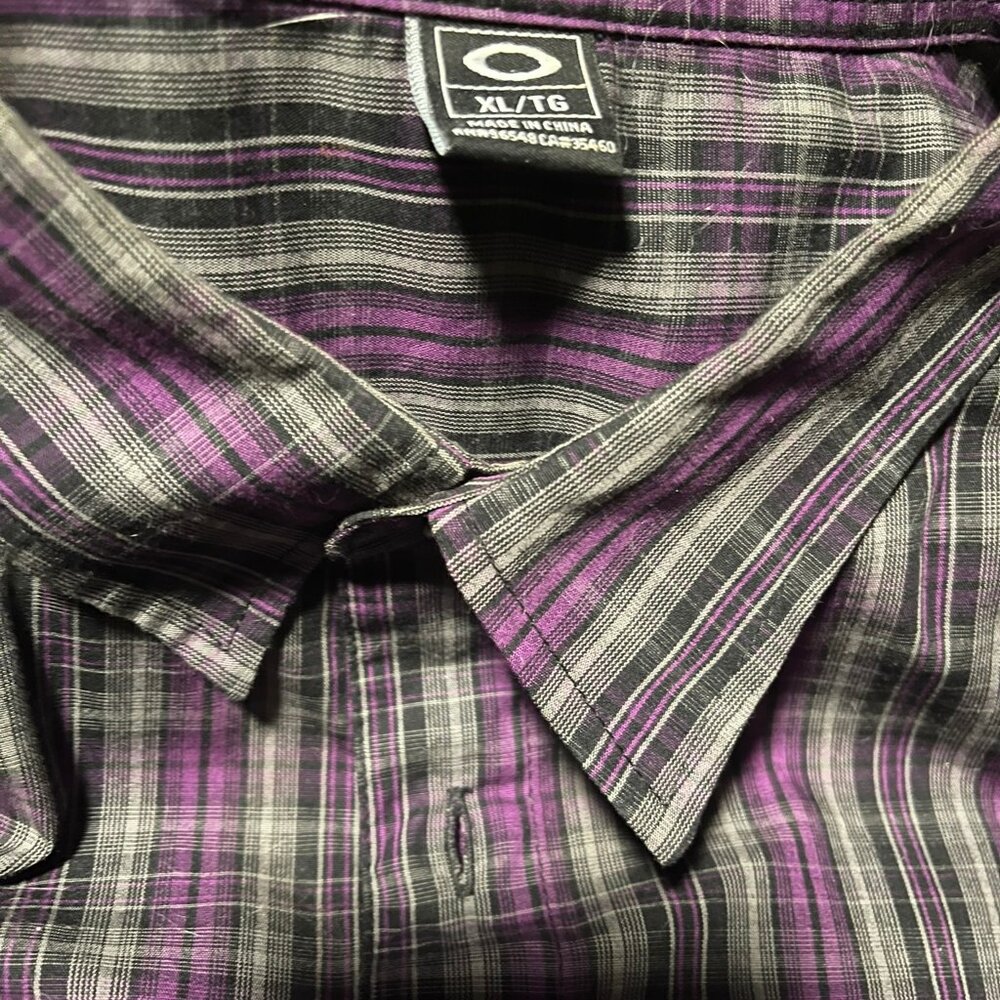 Two Men's Oakley Shirts